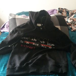 A Gucci hoodie
